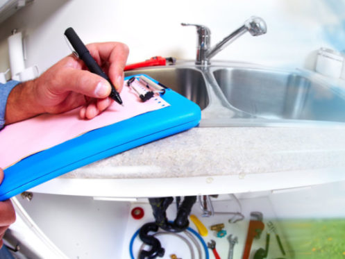 Plumbing Technician Inspecting Home Before Purchase in Wheeling, IL